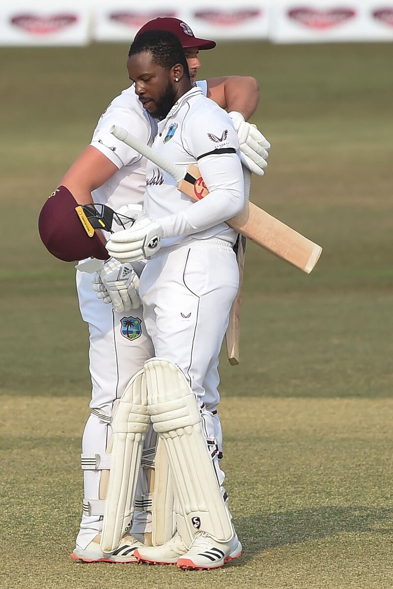 West Indies' Kyle Mayers celebrates reaching 150  with teammate Joshua Da Silva. AFP