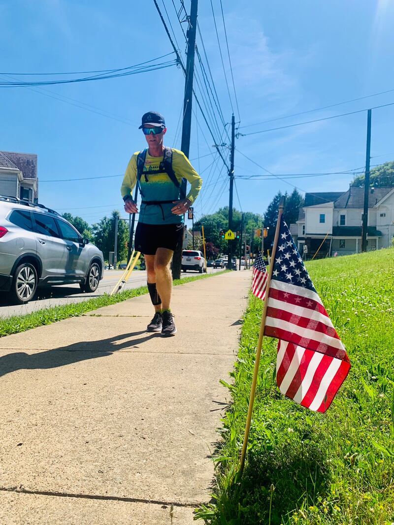 Former American University of Sharjah prof Nick Ashill completes a trans-American run from the spot where he was almost killed in a hit-and-run incident in 2017.
Photo: Nick Ashill