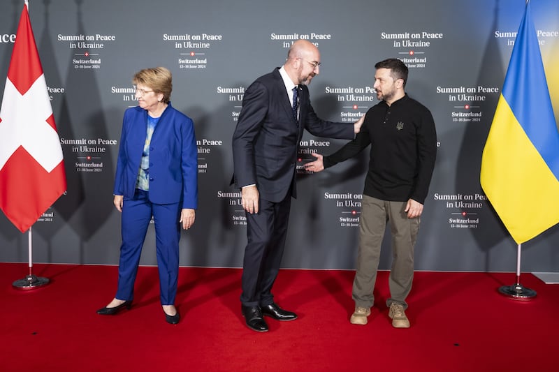 Swiss Federal President Viola Amherd, left, with Charles Michel, President of the European Council, centre, and Mr Zelenskyy. EPA 
