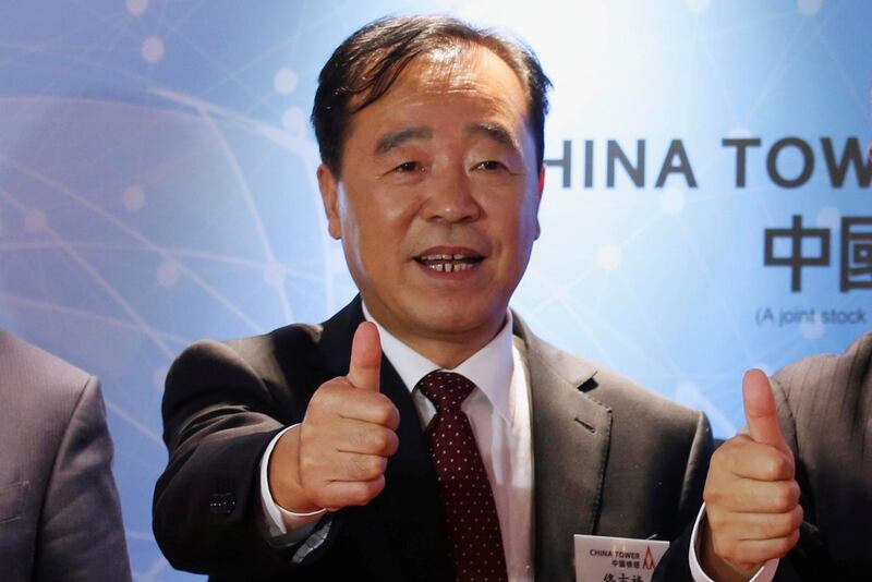 China Tower Corporation Limited Chairman, Executive Director and General Manager Tong Jilu poses at an investors luncheon before the IPO of the company in Hong Kong, China July 23, 2018.      REUTERS/Bobby Yip