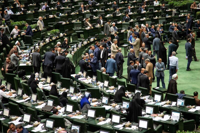 FILE PHOTO: Iranian lawmakers attend a session of parliament in Tehran, Iran July 16, 2019. Nazanin Tabatabaee/WANA (West Asia News Agency) via REUTERS. ATTENTION EDITORS - THIS IMAGE HAS BEEN SUPPLIED BY A THIRD PARTY. - RC1120AED380/File Photo