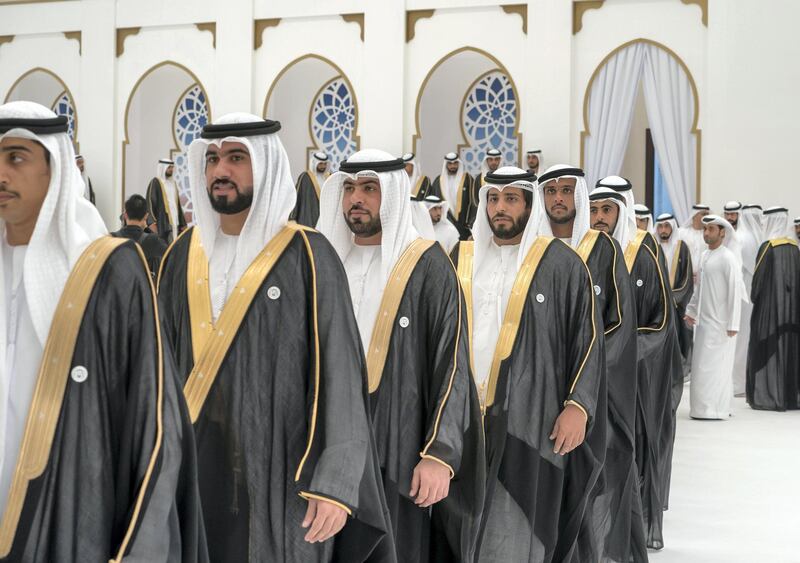 ADHAN, RAS AL KHAIMAH, UNITED ARAB EMIRATES - March 13, 2018: Grooms participate during a mass wedding reception for HH Sheikh Mohamed bin Saud bin Saqr Al Qasimi, Crown Prince and Deputy Ruler of Ras Al Khaimah (not shown), at Mohamed bin Zayed, Al Bayt Mitwahid wedding hall. 

( Mohamed Al Hammadi / Crown Prince Court - Abu Dhabi )
---