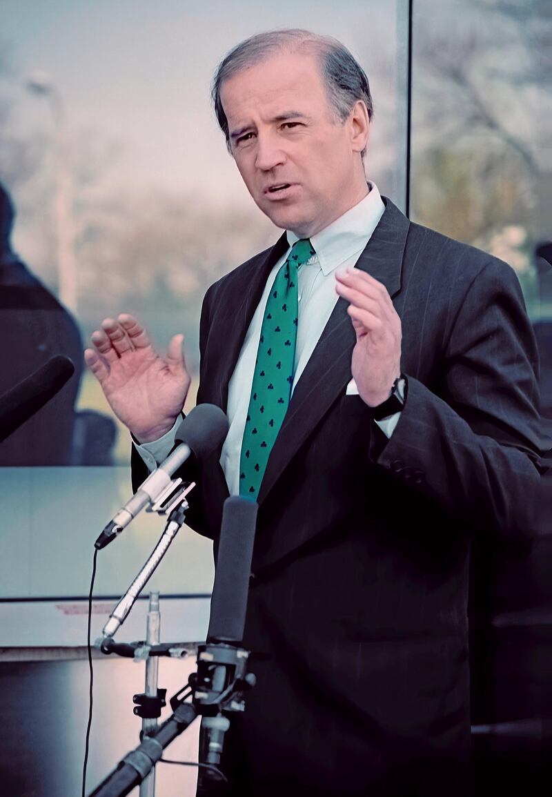 Senator Joe Biden (D-DE.) wearing a green tie in honor of the St. Patrick's Day celebration, talks with reporters outside the NBC TV studio's after appearing on the Sunday morning talk show "Meet The Press"  Washington, DC. March 18, 1990 (Photo by Mark Reinstein/Corbis via Getty Images)