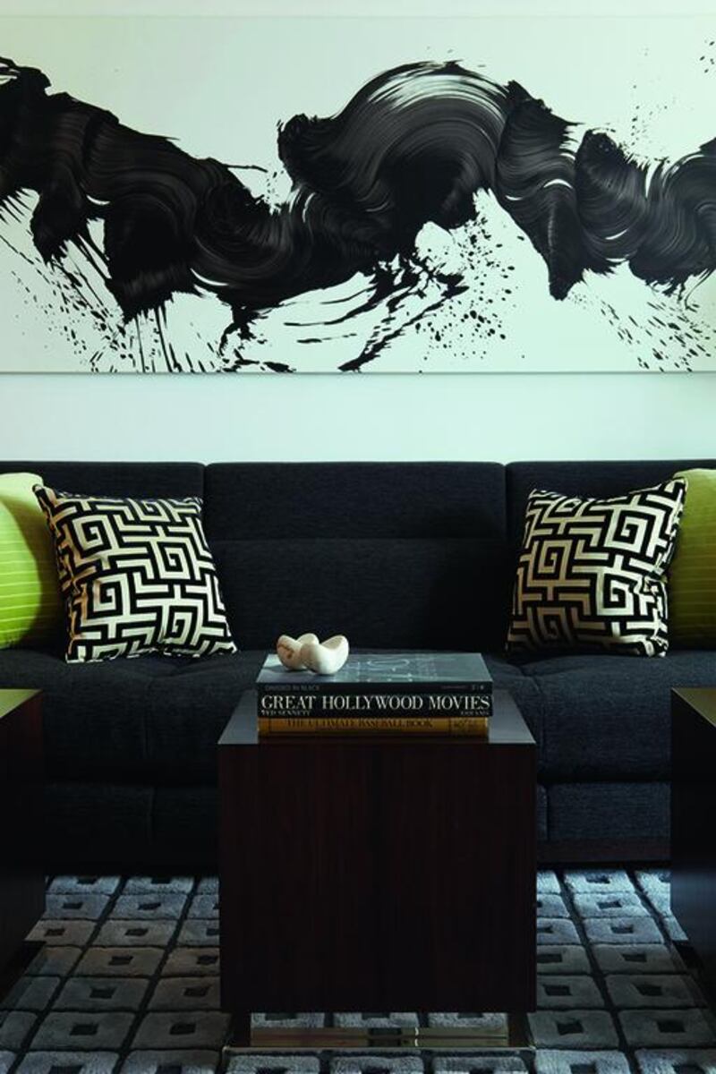 Black-and-white imagery adorns some walls to dramatic effect. Courtesy Anastassios Mentis