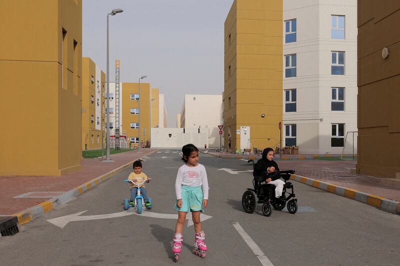 Tuqa sits in her wheelchair as she watches other Palestinian children play at Emirates Humanitarian City. Reuters