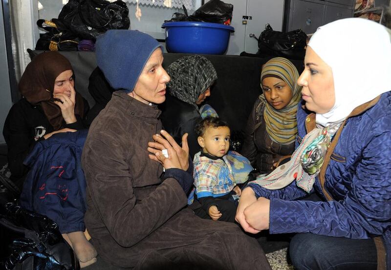 What were the motives behind ISIL's intrusion into the Yarmouk refugee camp in Damascus?  Motaz Mawed / EPA 