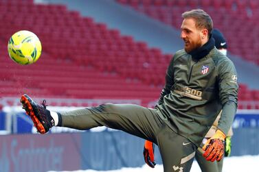 epa08931423 A handout photo made available by Atletico Madrid shows Atletico Madrid's Slovenian goalkeeper Jan Oblak in action during a training session at Wanda Metropolitano Stadium in Madrid, Spain, 11 January 2021. The team prepares its upcoming LaLiga game against Sevilla on 12 January at Wanda Metropolitano Stadium. EPA/- HANDOUT EDITORIAL USE ONLY/NO SALES