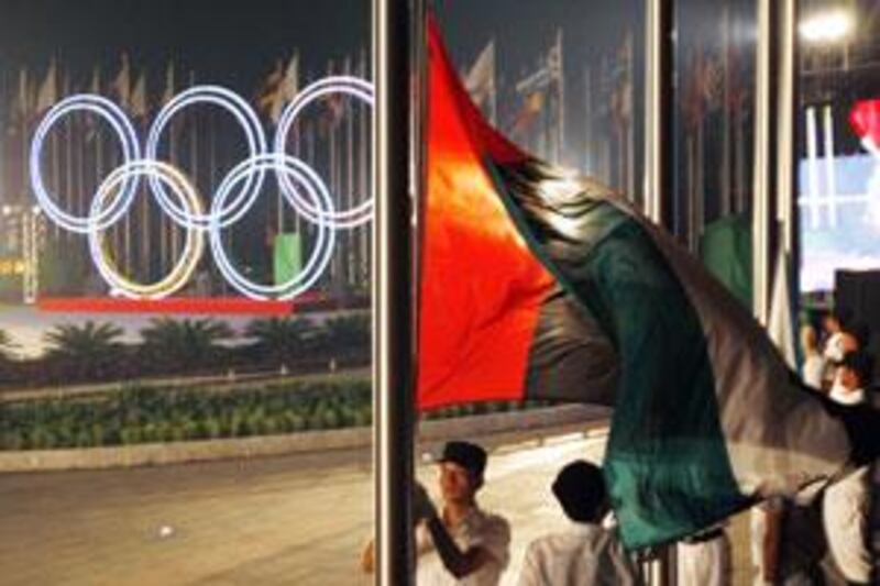 The UAE flag is raised during a ceremony at the Olympic Village, in Beijing during last year's Games.