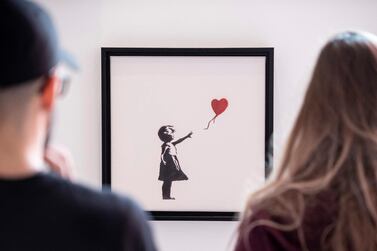 'Girl with Balloon' is one of British graffiti artist Banksy's most well-known works. EPA