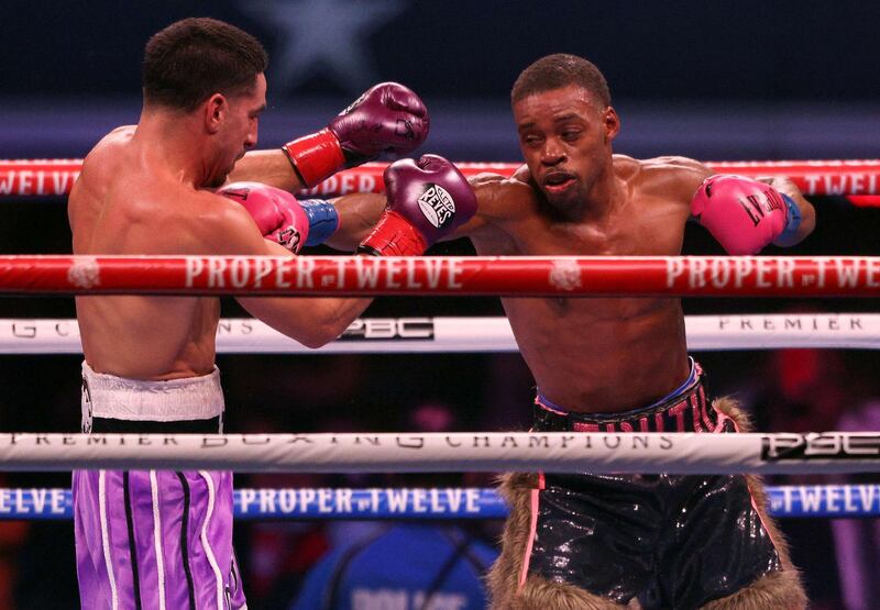 ARLINGTON, TEXAS - DECEMBER 05: (L-R) Danny Garcia and Errol Spence Jr. during their WBC & IBF World Welterweight Championship fight at AT&T Stadium on December 05, 2020 in Arlington, Texas.   Ronald Martinez/Getty Images/AFP
== FOR NEWSPAPERS, INTERNET, TELCOS & TELEVISION USE ONLY ==
