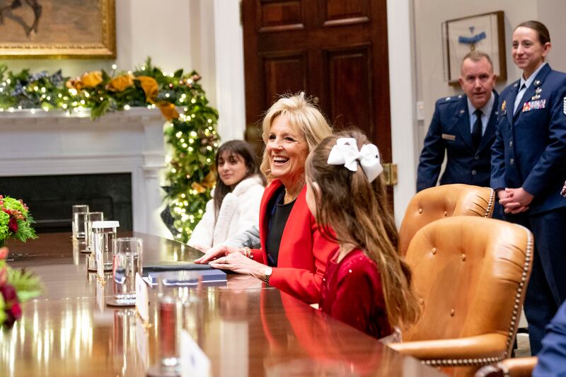 Ms Biden in the Roosevelt Room with children of military families. AP