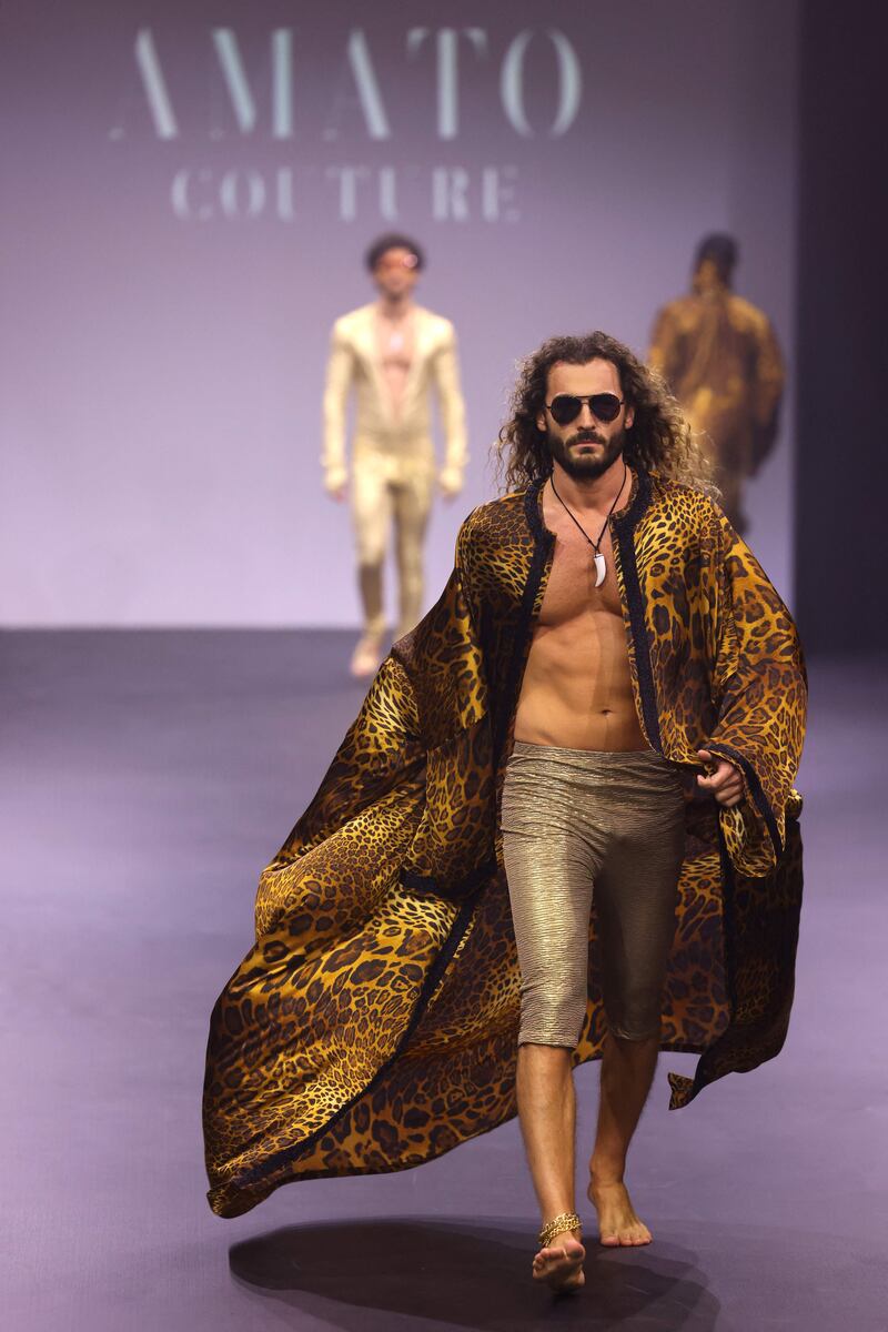 Billowing robes, capes, and trench-like jackets in glistening silk were the standouts.