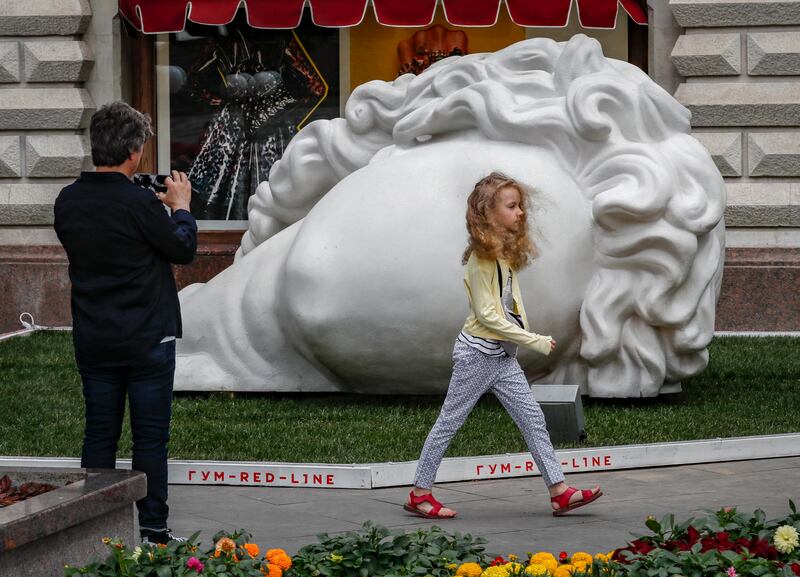 The artwork 'Head From Ancient Times', by Russian artist Aristarkh Chernyshev, on display at an exhibition of Russian public art, 'Red Garden', part of a festival in Red Square in Moscow. The exhibition runs until August 31.