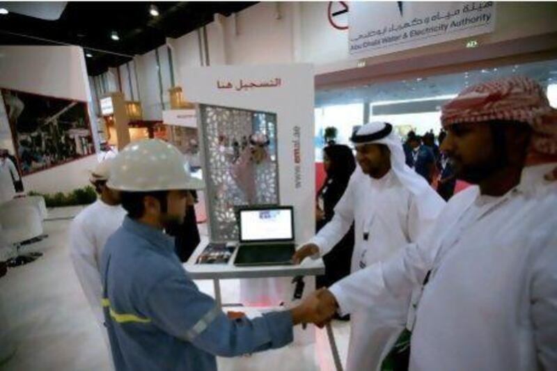 Job seekers attend the Tawdheef exhibition at Adnec. Fatima Al Marzooqi / The National