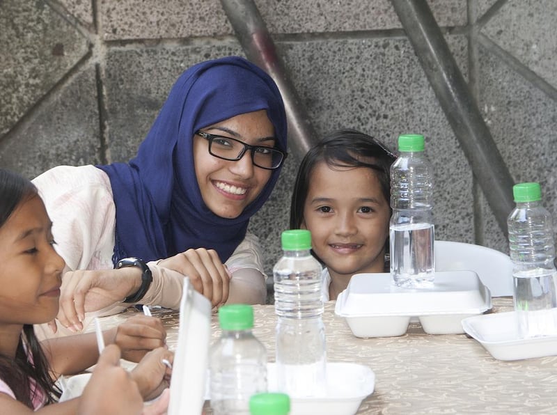 Mariam Al Kuwaiti says meeting Filipino children who struggle to get enough to eat has prompted her to change her habits and stop throwing food away. Courtesy Beyond Borders