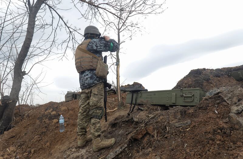 A Ukrainian soldier in a zone between Luhansk and Donetsk on April 18 amid increasing Russian troop activity. EPA