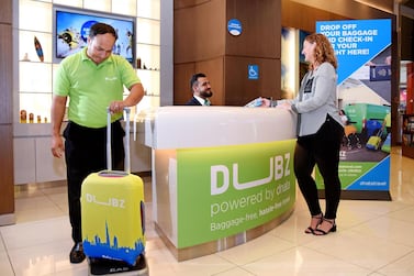 Travellers flying with select airlines from Dubai Airport can now check-in and drop luggage at The Dubai Mall's Dubz Dnata station. Courtesy Dnata Travel