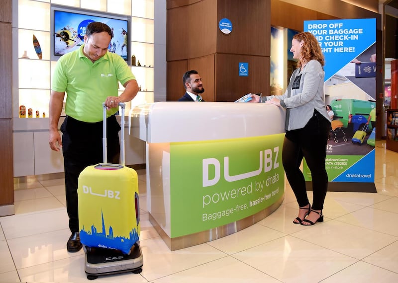 Travellers flying with select airlines from Dubai Airport can now check-in and drop luggage at The Dubai Mall's Dubz Dnata station. Courtesy Dnata Travel