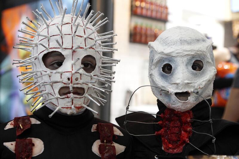 Children in Halloween costumes are seen in Medellin, Colombia. EPA