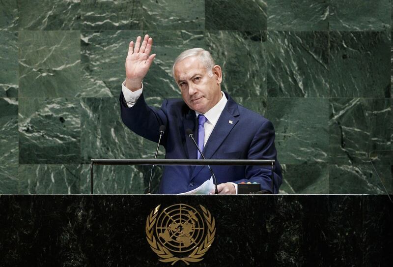 epa07051936 Israeli Prime Minister Benjamin Netanyahu waves after addressing the General Debate of the 73rd session of the General Assembly of the United Nations at United Nations Headquarters in New York, New York, USA, 27 September 2018. The General Debate of the 73rd session began on 25 September 2018 and runs until 01 October 2018.  EPA/JUSTIN LANE