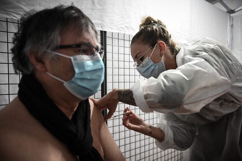 A patient receives an injection of the Moderna Covid-19 vaccine in Merignac on the outskirts of Bordeaux, south-western France. AFP