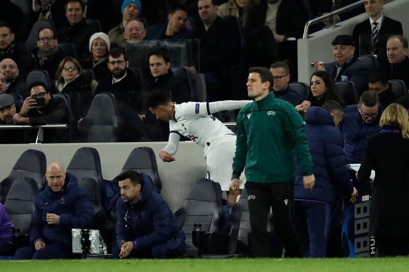 Dele All gets angry as he is being substituted by Tottenham's Erik Lamela. AP