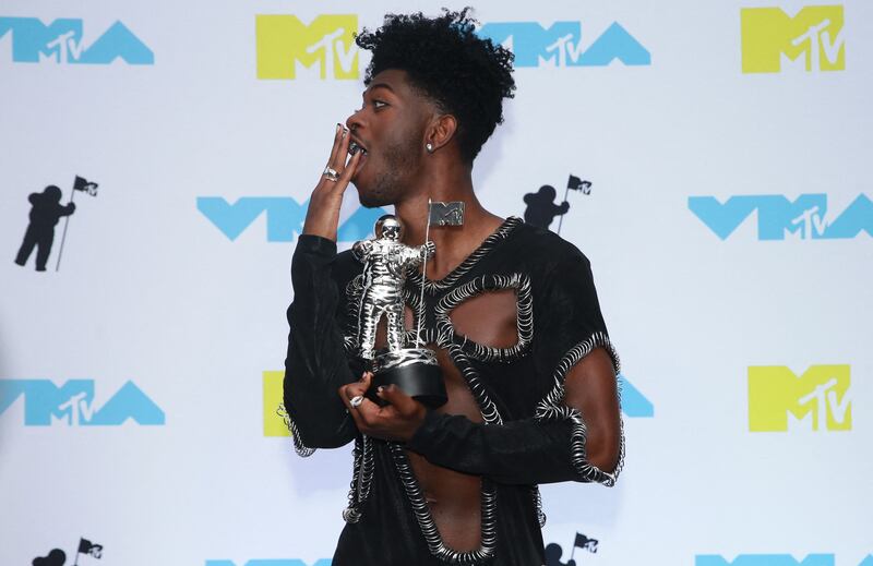 US rapper Lil Nas X poses with the award for Best Collaboration for 'Industry Baby'. AFP