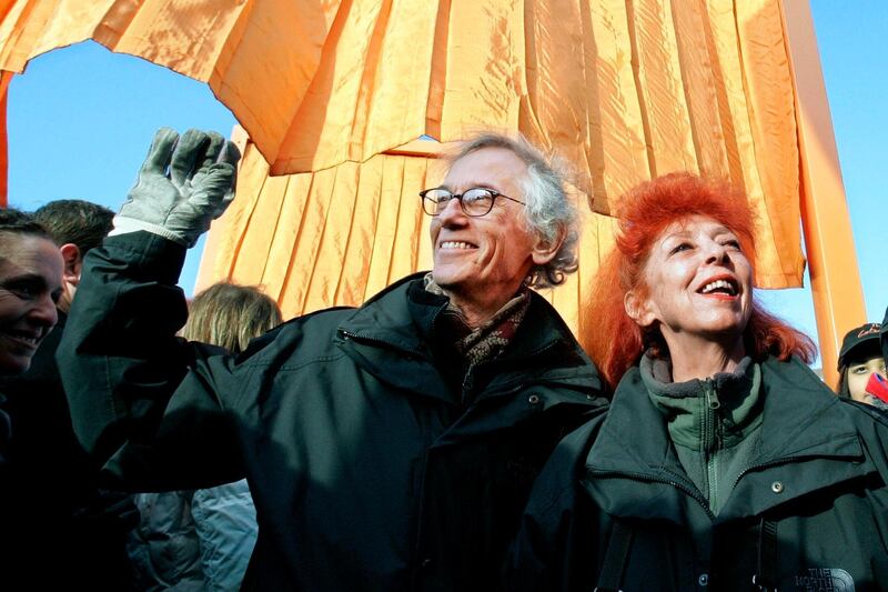 Artists Christo, left, and his wife and partner Jeanne-Claude, participate in opening 'The Gates' project in New York's Central Park in 1995. AP Photo