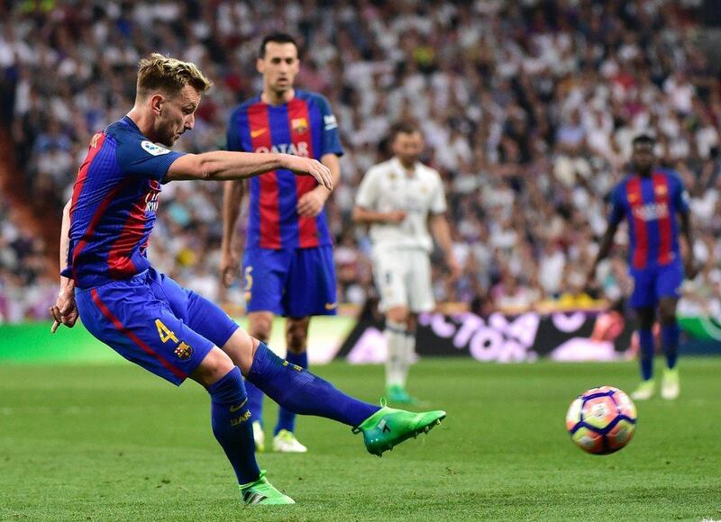 Rakitic shoots to score. Gerard Julien / AFP