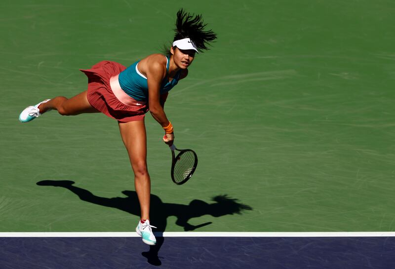Emma Raducanu of Great Britain serves against Caroline Garcia of France in their second round match on Day 5 of the BNP Paribas Open. Reuters