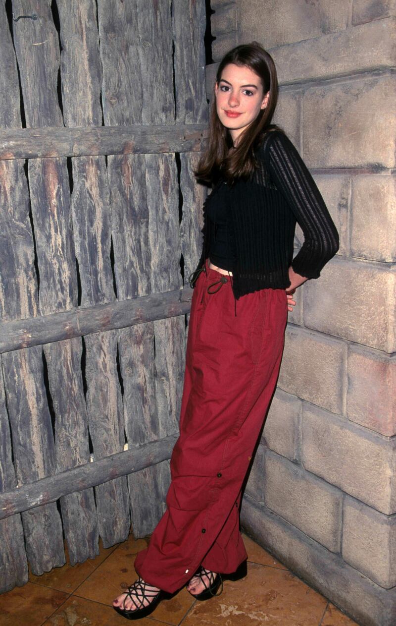 Anne Hathaway At The Fox Teen Press Junket Planet Hollywood In Los Angeles, CA 07-23-1999. Credit: 3553583Globe Photos/MediaPunch /IPX