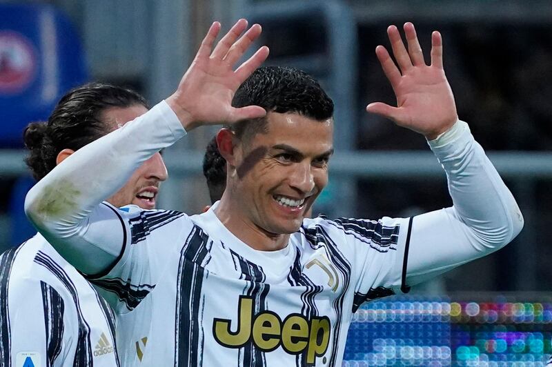 Ronaldo celebrates his hat-trick. AP