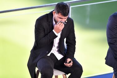 Barcelona's Argentinian forward Kun Aguero reacts as he addresses a press conference to announce his retirement from football, at the Camp Nou stadium in Barcelona, on December 15, 2021.  (Photo by Pau BARRENA  /  AFP)