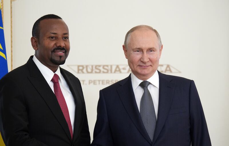 Russian President Vladimir Putin with Ethiopian Prime Minister Abiy Ahmed before the summit in St Petersburg. EPA