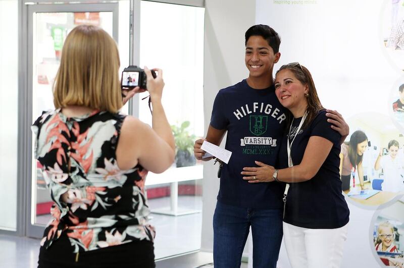Youssef El Emam and his mother Samar Shaker after he received his A Level results from the Dubai British School. Pawan Singh / The National