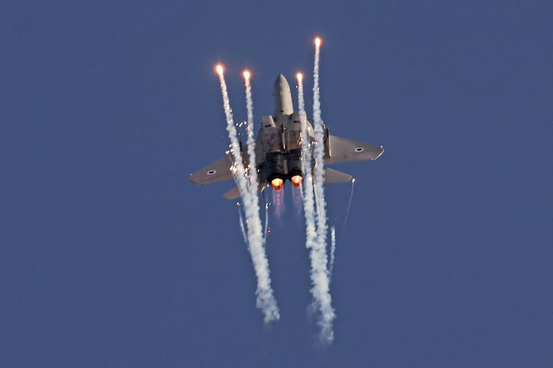 A F-15 fighter jet takes part in an aerial display during the graduation ceremony of Israeli air force pilots. AFP