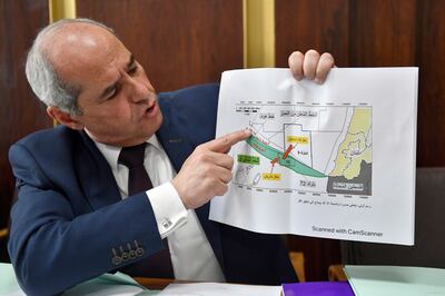 Lebanese MP Melhem Khalaf holds up a map of the Line 29 maritime demarcation zone in Beirut. Mr Khalaf claimed Israel was drilling for oil in some fields, including those adjacent to the Lebanese border. EPA