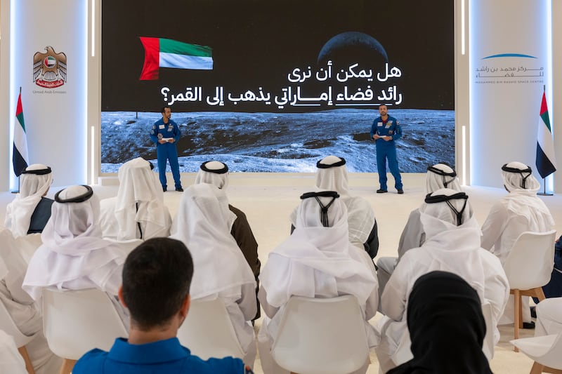 UAE astronauts and Hazza Al Mansoori, left, and Sultan Al Neyadi deliver a presentation at Qasr Al Watan. Photo: Abdulla Al Neyadi Presidential Court 