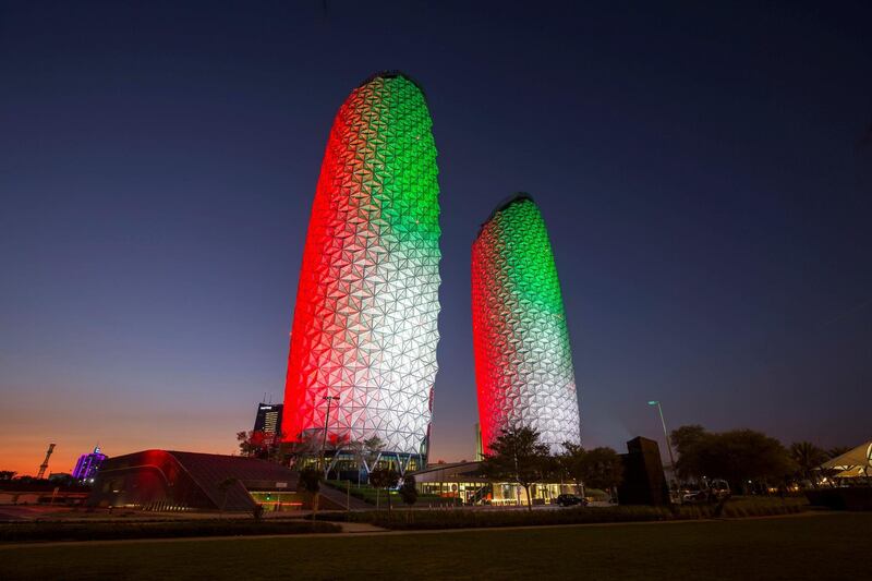 Abu Dhabi, United Arab Emirates - Al Bahr Towers lighting up on different colours to celebrate UAE National day.  Leslie Pableo for The National