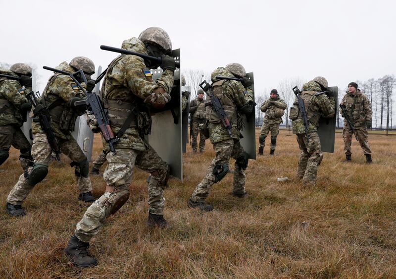 Members of Ukraine's State Border Guard Service attend a training session in Volyn. Reuters