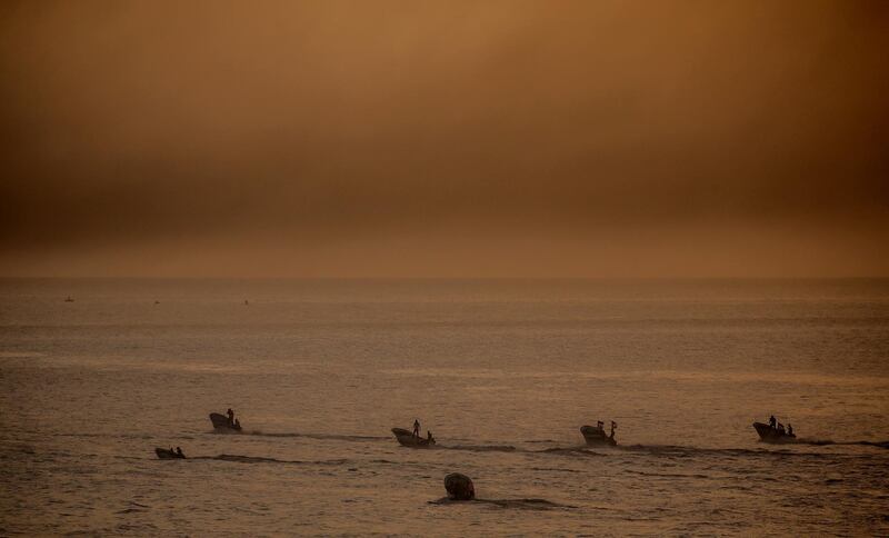 Protesters ride boats during clashes near the border between Israel and the Gaza Strip. EPA