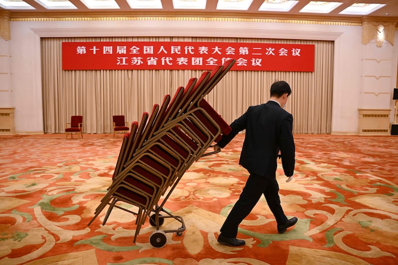 A room is cleared after the Jiangsu province delegation meeting at the National People's Congress at the Great Hall of the People in Beijing. AFP