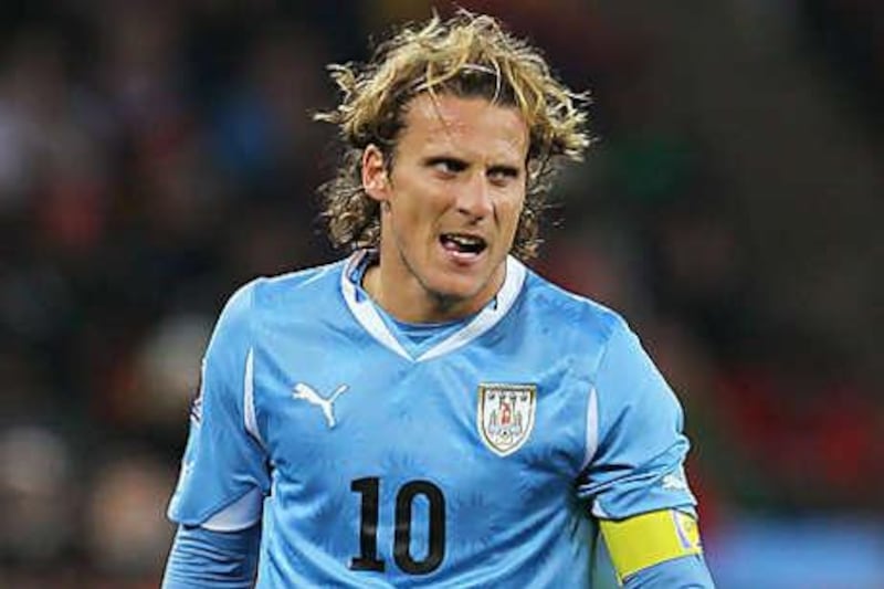 Diego Forlan will lead the Uruguay attack as they seek their first appearance in the World Cup final since 1950.