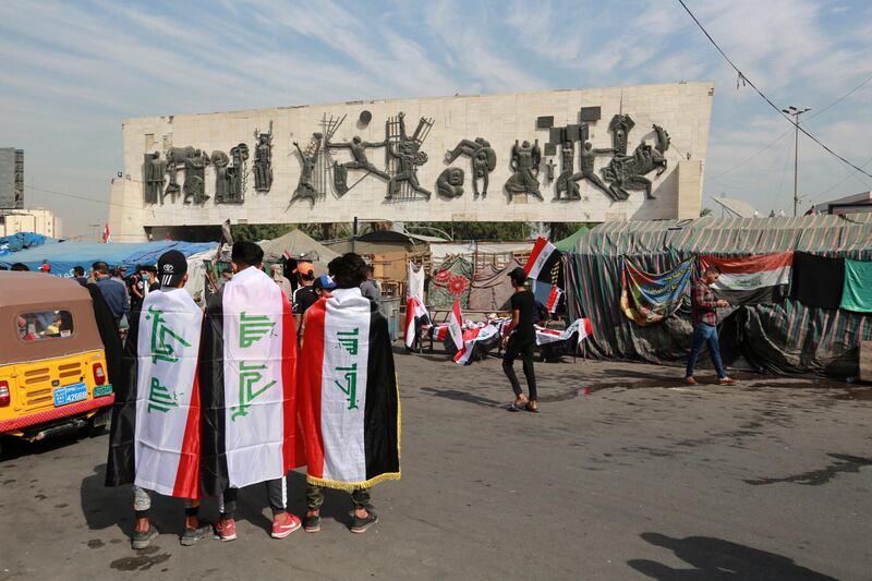 Protesters take part in a demonstration in Baghdad. EPA