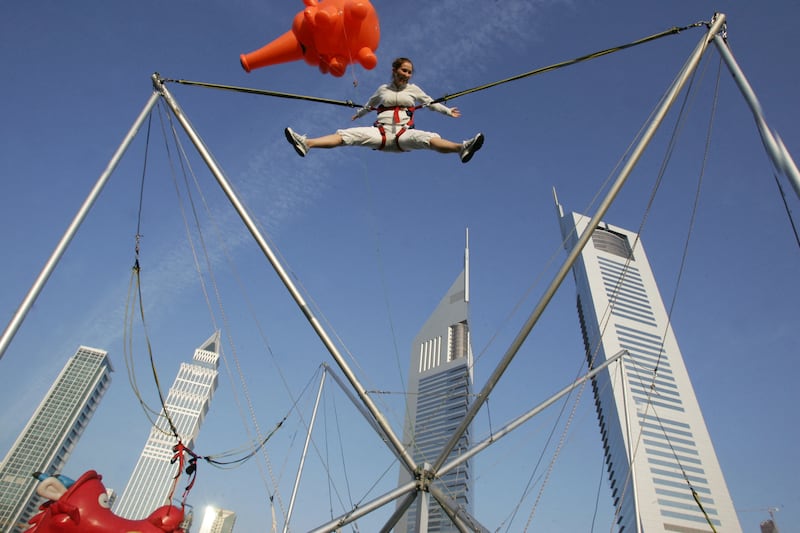 An airborne tourist in Dubai enjoys one of the shopping festival activities in 2007. AFP