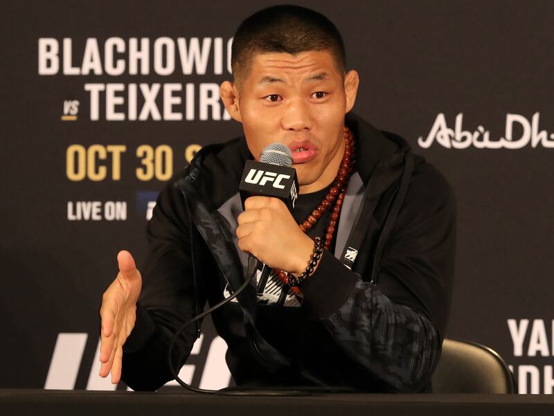 Li Jingliang speaks to the press ahead of his welterweight bout against Khamzat Chimaev.