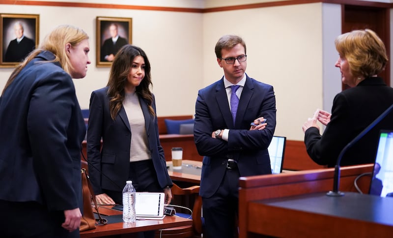 Depp's lawyer Ms Vasquez and Heard's lawyer Ms Bredehoft speak in the courtroom before testimony. AP