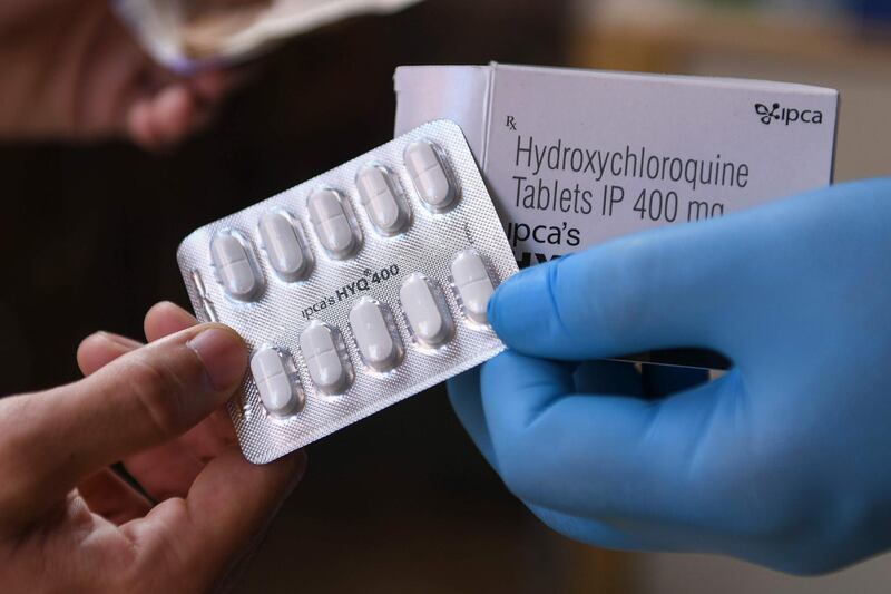 This photo taken on April 27, 2020 shows a vendor displaying hydroxychloroquine (HCQ) tablets at a pharmacy in Amritsar. India has ramped up output of an anti-malarial drug hailed by US President Donald Trump as a "game-changer" in the fight against coronavirus, even as its pharmaceutical industry struggles to make other key medicines in a lockdown. - TO GO WITH AFP STORY health-virus-India-pharmaceutical by Bhuvan Bagga and Vishal Manve
 / AFP / NARINDER NANU / TO GO WITH AFP STORY health-virus-India-pharmaceutical by Bhuvan Bagga and Vishal Manve
