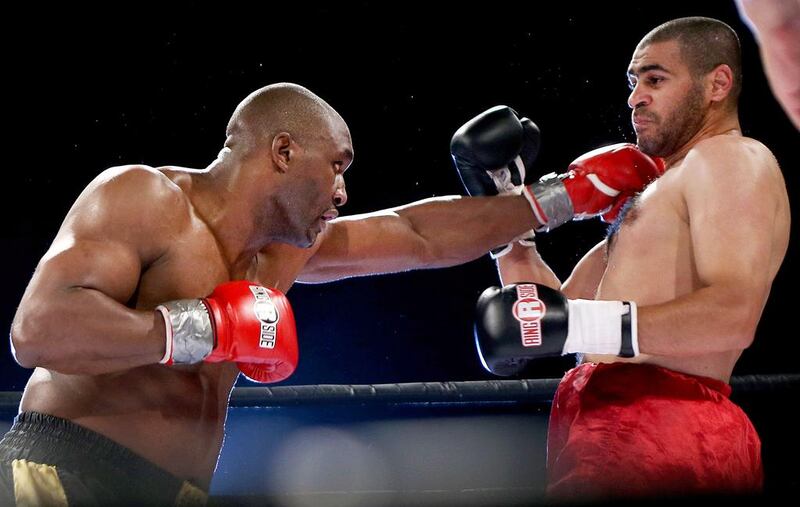 Danny Williams, left, easily beat Mazur Ali during their headline heavyweight bout at Yas Island.  Sammy Dallal / The National