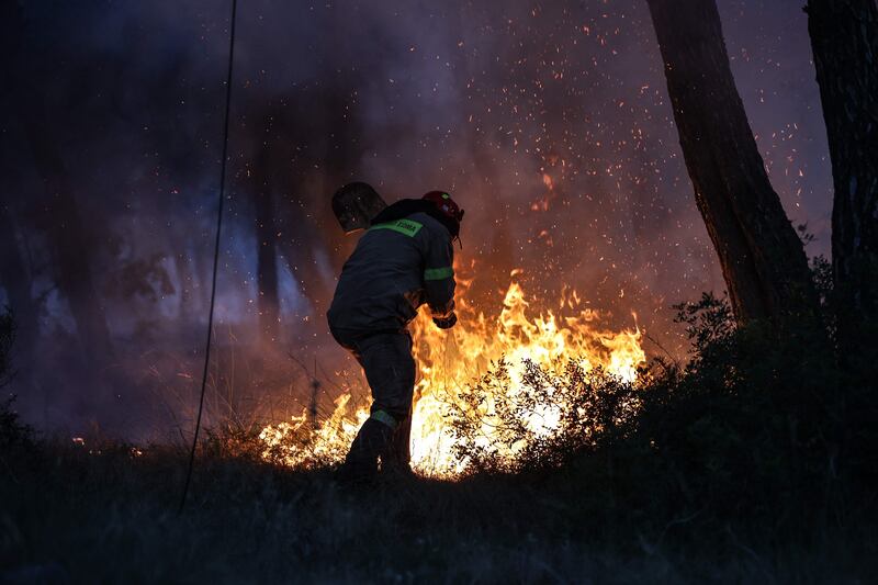 A firefighter in Megara, west of Athens.  AFP